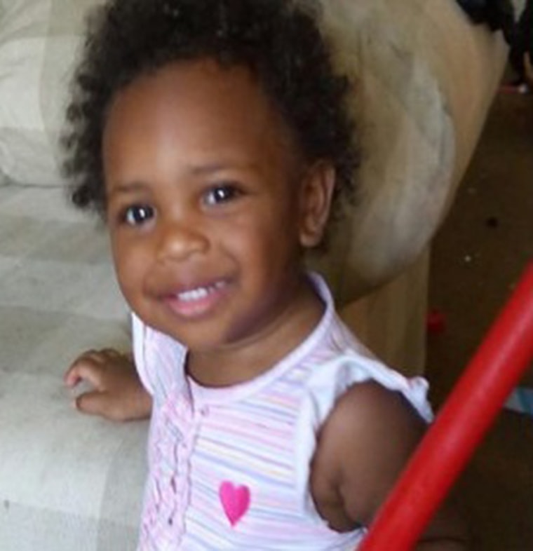 J'zyra Thompson, 19 months old, died after being burned in an oven.