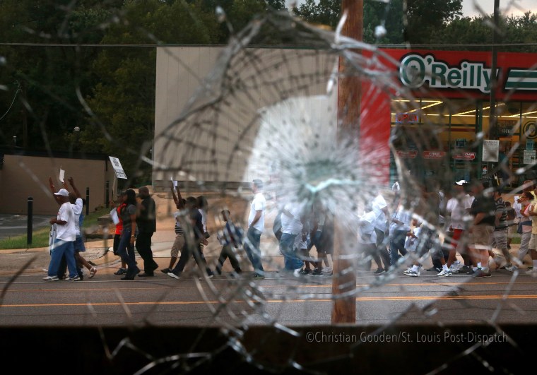 Peaceful marches resume in Ferguson