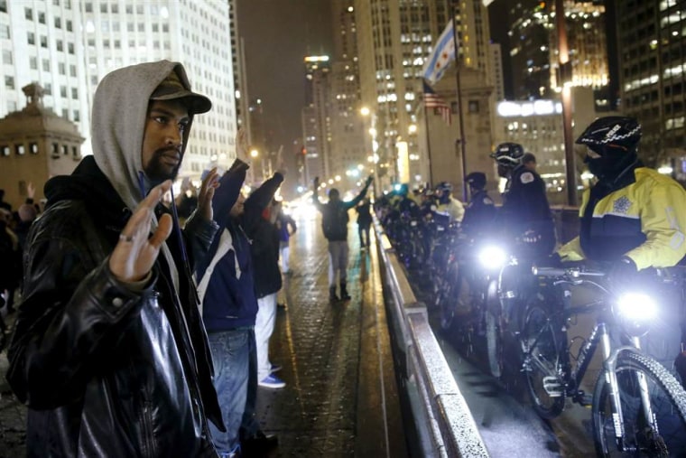 IMAGE: Chicago protesters confront police