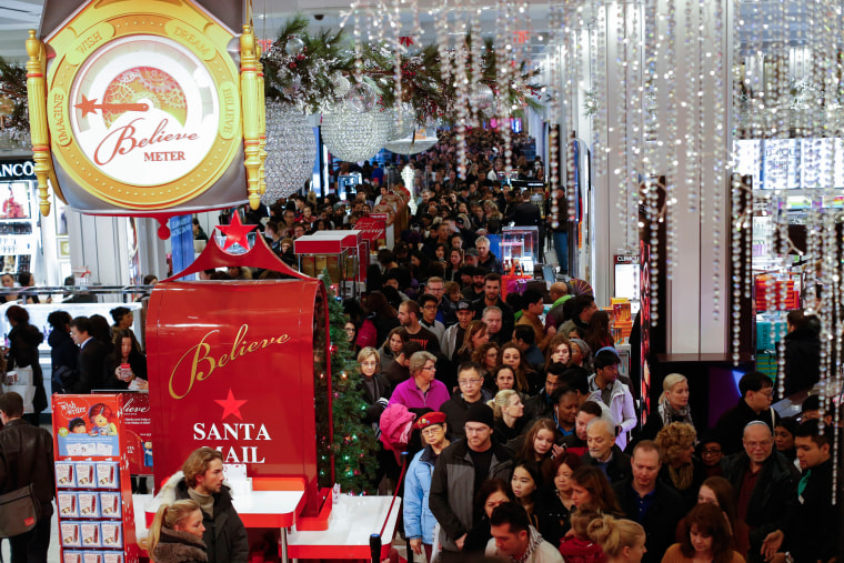 Image: Customers stream into Macy's flagship store
