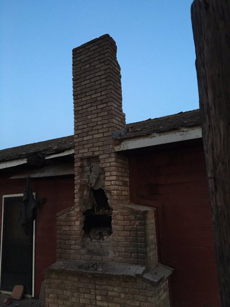 The chimney where the man was found in Huron, California, Saturday.