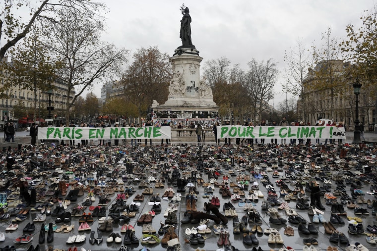Image: Hundreds of pairs of shoes are displayed at the Place de la Republique, in Paris.