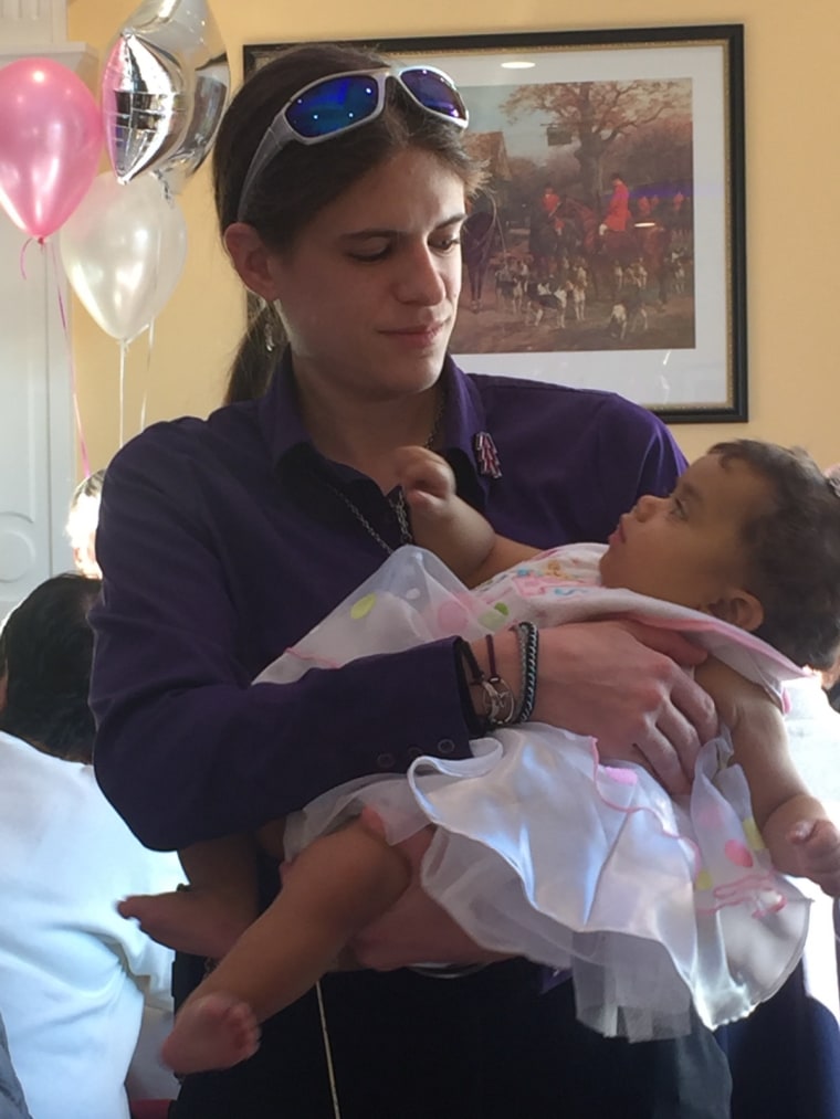 Diana Rotter holds 1-year-old Natalia, the baby who received part of her liver.