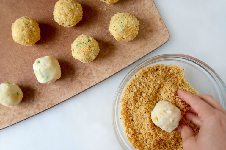 Breading the cheesy leftover turkey and mashed potato bites