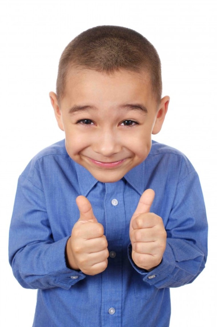 Little boy giving thumbs up