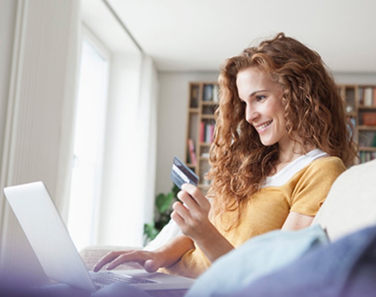 Smiling woman at home shopping online; Shutterstock ID 323082524; PO: today.com