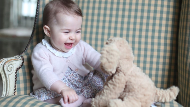 Princess Charlotte of Cambridge with her cuddly toy dog