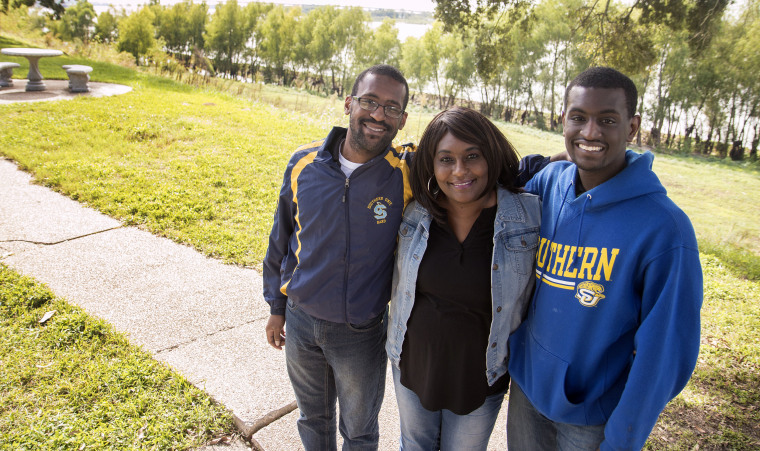 Image: Brothers Micah and Josiah Frank pose for a photo with their mother Latonzia Montgomery on the Southern University campus in Baton Rouge, Louisiana.