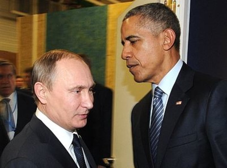 Image: Vladimir Putin shakes hands with Barack Obama.