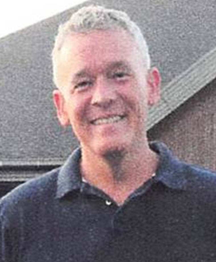 Mike Kimsey is described as 5'11\" tall, weighing 200 lbs., with grey hair.