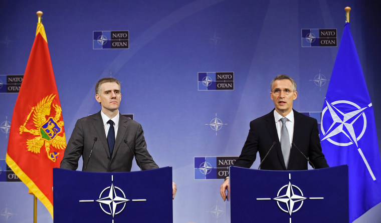 Image: NATO Secretary General Jens Stoltenberg and Montenegro's Foreign Minister Igor Luksic