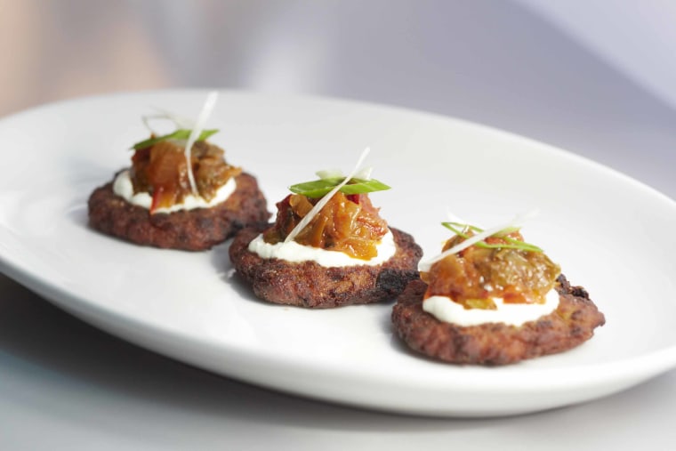 Tortillita de Calabacín (zucchini fritters with roasted tomato-cumin sauce), from La Vara restaurant in Brooklyn, NY.