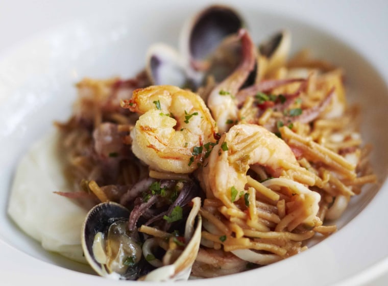 Fideuà (Valencian style noodle paella with shrimp, squid, clams) from La Vara restaurant, in Brooklyn, NY.