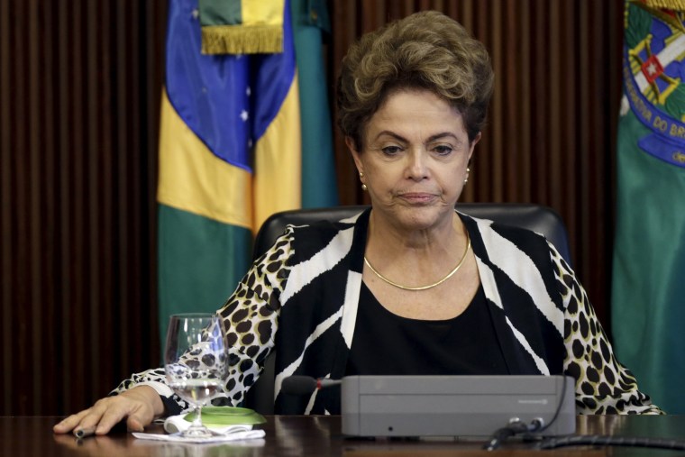 Image: Brazil's President Dilma Rousseff reacts during a meeting with ministers at the Planalto Palace in Brasilia