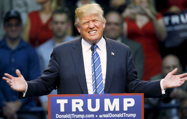 Image: U.S. Republican presidential candidate Donald Trump reacts while addressing supporters at a Trump for President campaign rally in Raleigh