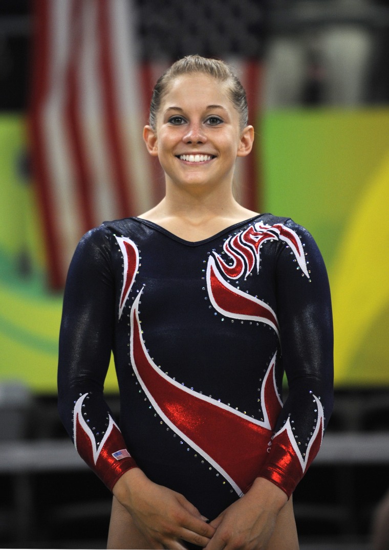 United States' Shawn Johnson stands on the podium after the women's balance beam final of the artistic gymnastics event of the Beijing 2008 Olympic Games.