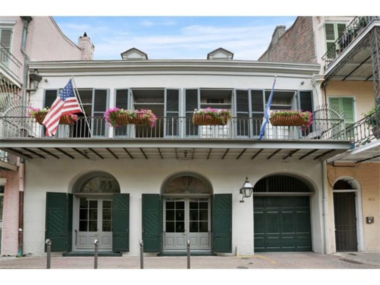 Brad Pitt and Angelina Jolie lower listing price of New Orleans home.