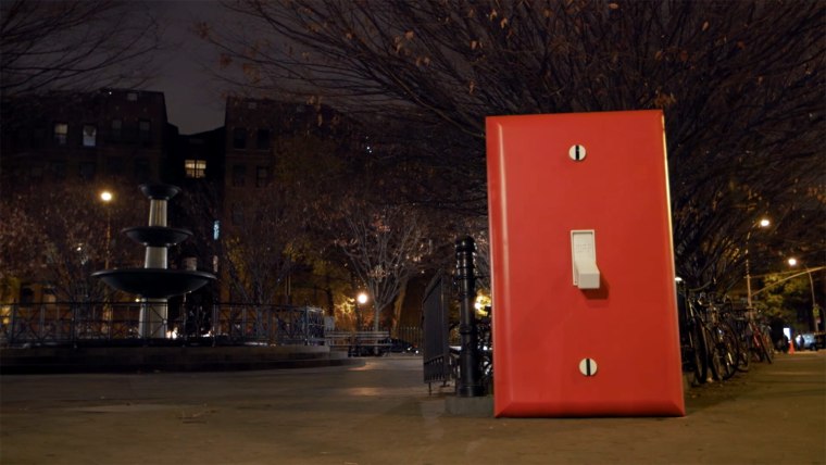 Improv Everywhere's latest holiday stunt teased New Yorkers with a giant light switch and no further instructions.