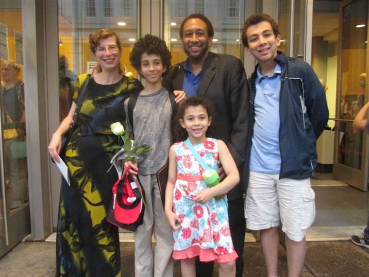 Alina Adams with her husband and three children, who have come to accept her no-gift Hanukkah tradition.