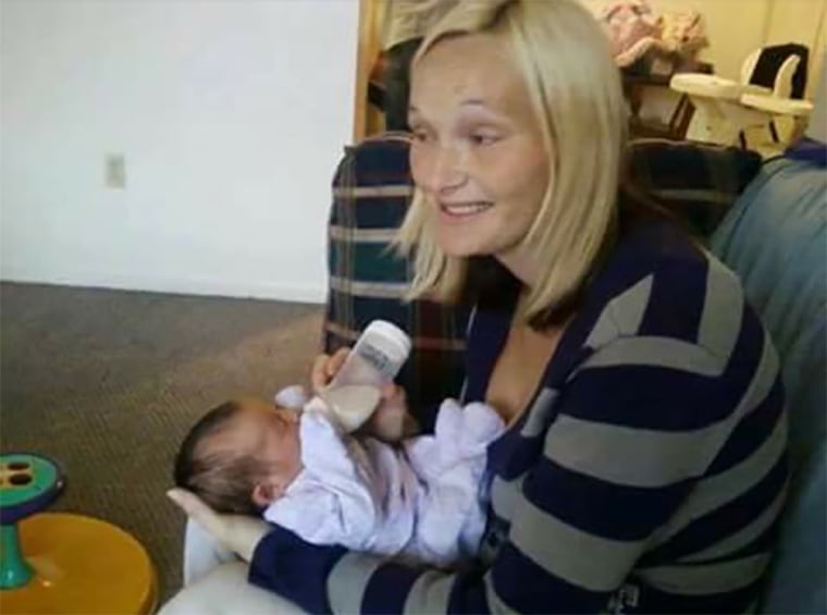 Angelica Richardson McKenney feeds her daughter, Lynndaya, in December 2012. The snapshot was taken the day before McKenney, high on a trio of drugs, fell asleep on top of Lynndaya and suffocated her.