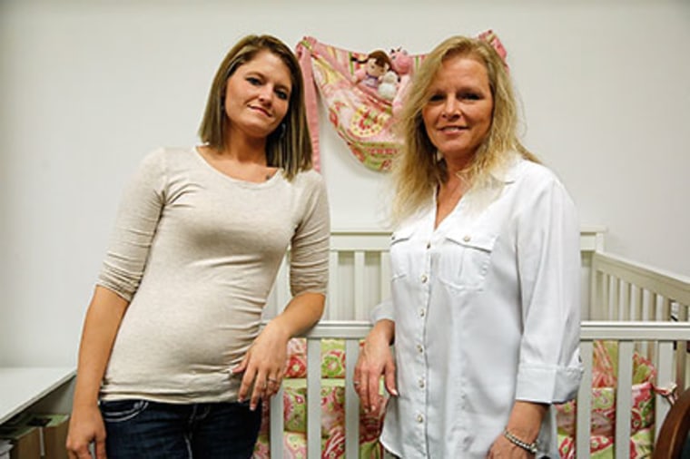 Katy Yeager Gooding and  social worker Angela Davis , right, on a visit with her baby Kennedy Gooding to Lily's Place.