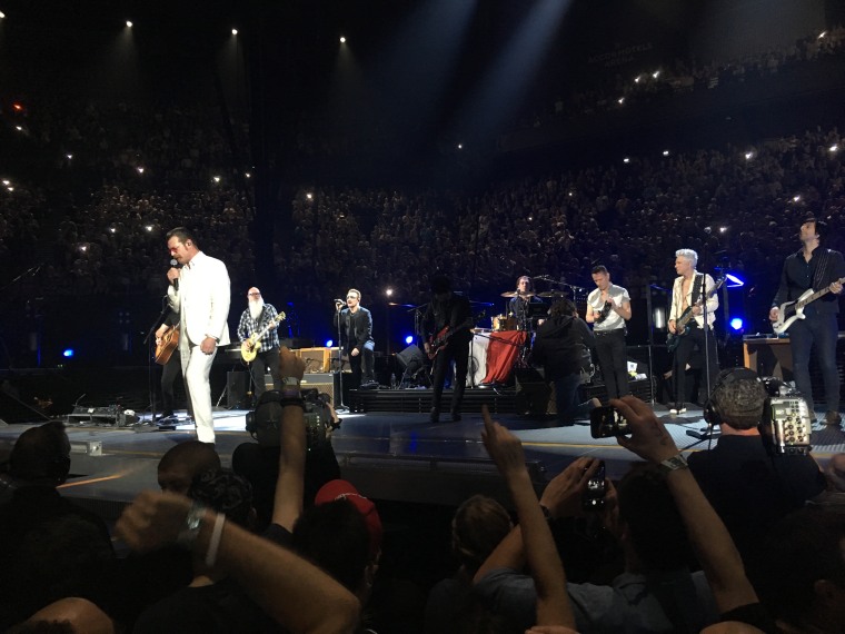 Nearly a month after the Bataclan was attacked by terrorists, the Eagles of Death Metal returned to Paris and joined U2 on stage.
