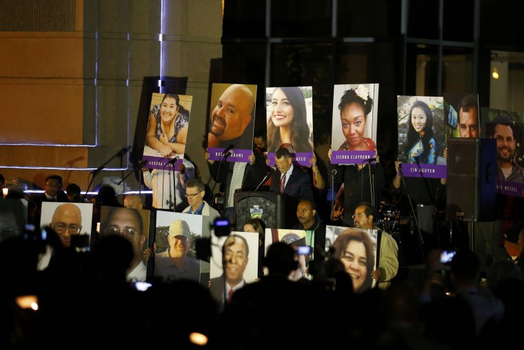 Image: Photos of the victims at San Bernardino vigil