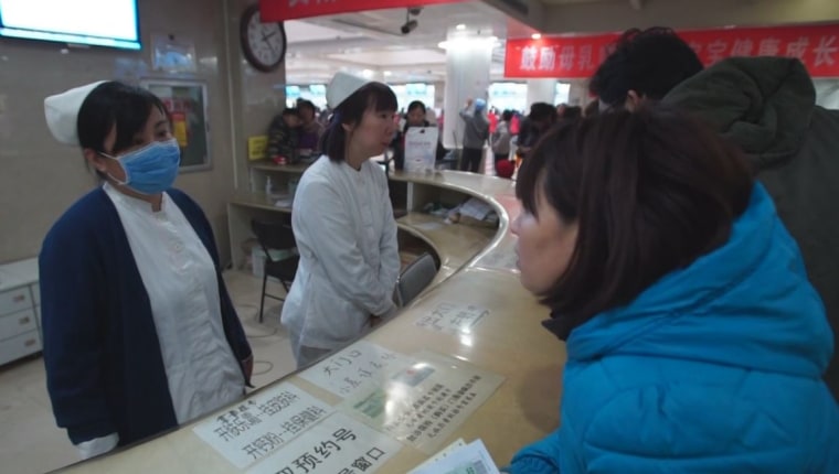 Image: Worker at Beijing Children's Hospital