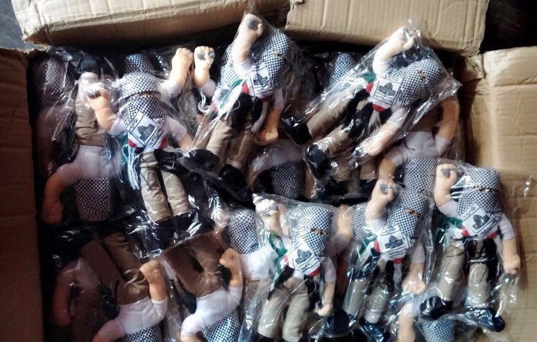 Image: Some of the 4,000 dolls in a box