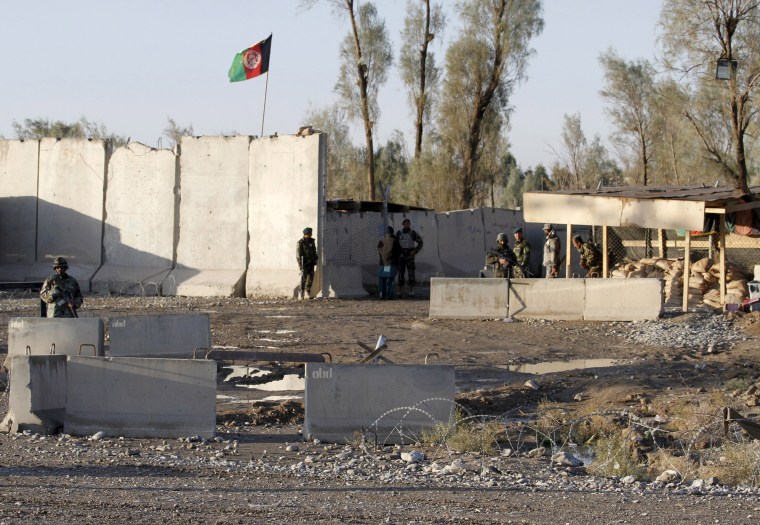 Image: Afghan security forces at the entrance gate of Kandahar Airport