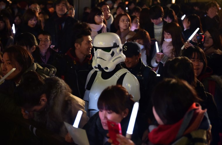 Image: A fan dressed as a Stormtrooper at a promotional event in Tokyo