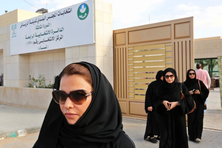 Image: Saudi women head to polls in municipal elections for first time