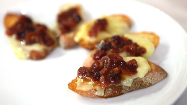 Phyllo-Wrapped Baked Brie with Spiced Boozy Cranberry Relish & Crostinis