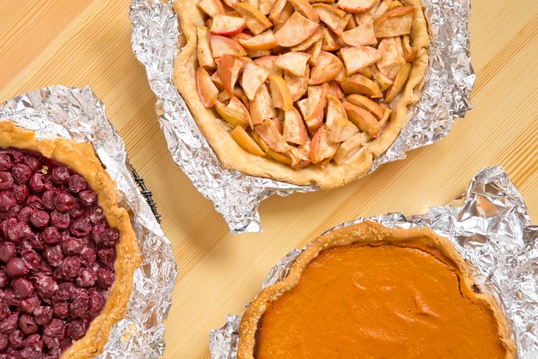 How to Make The Cherpumple step-by-step: Bake the pumpkin pie, apple pie and cherry pie