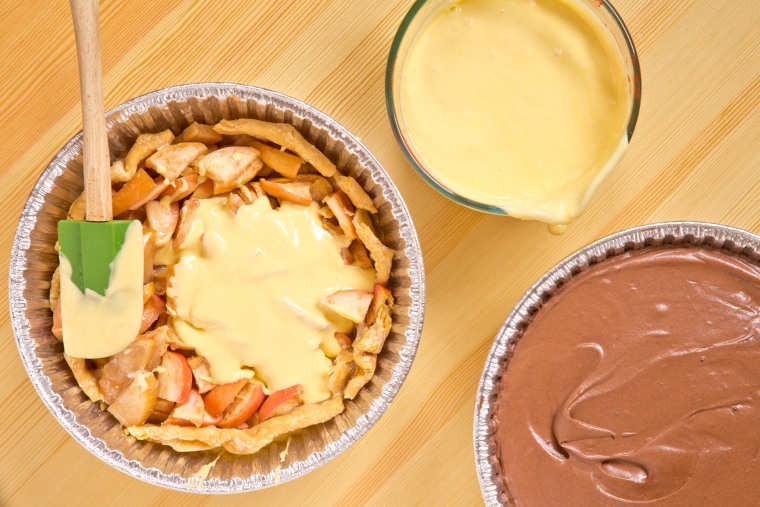 How to Make The Cherpumple Step-by-Step: Pour the remaining Yellow Cake batter over the Apple Pie