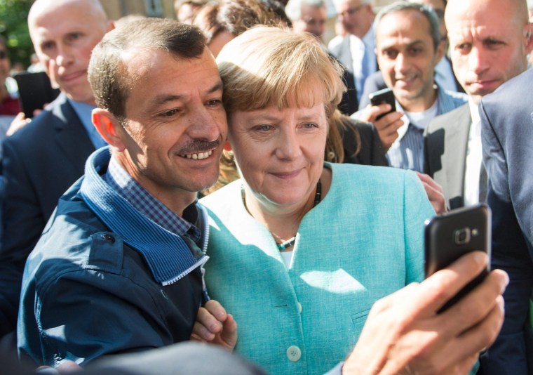 Merkel visits the Berlin branch of the Federal Office for Migration and Refugees (BAMF).