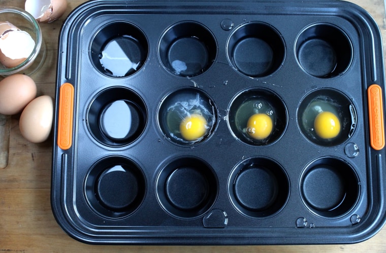Crispy Rösti Potatoes with Oven-Poached Eggs: To poach the eggs, add oil, eggs and boiling water to each compartment of a muffin tin