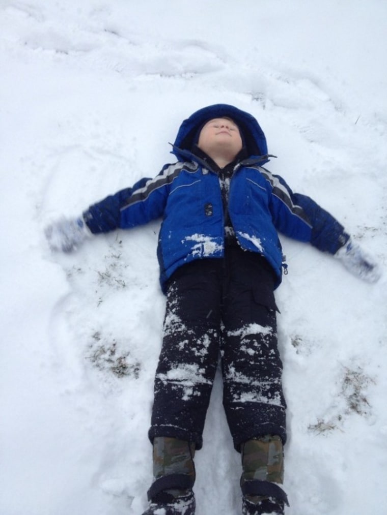 Amanda Mushro's son playing in snow
