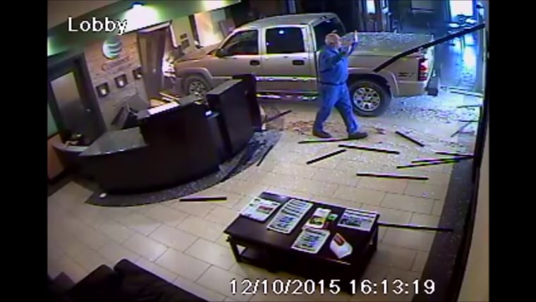 IMAGE: Driver walks away after ramming Oklahoma hotel desk with truck