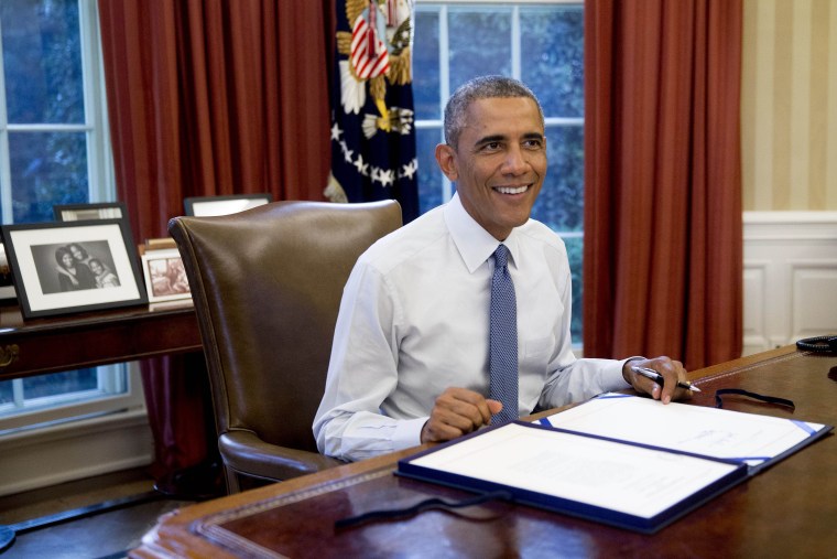 President Obama Signs H.J. Res. 124, Continuing Appropriations Resolution, 2015