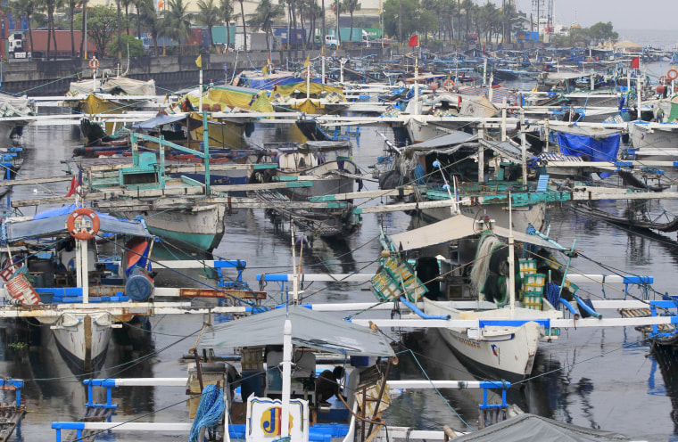 Image: Fishing boats are docked at the Manila bay in Navotas city, north of the capital