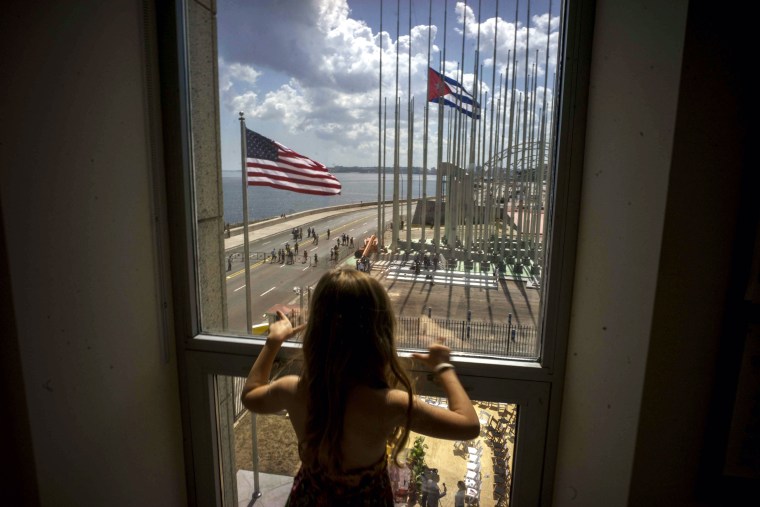 Image: A child at the newly opened U.S. Embassy in Havana