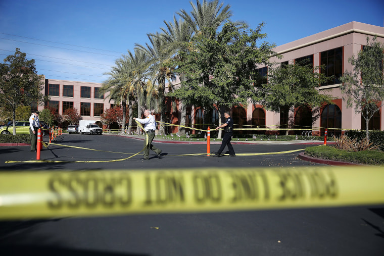 Image: Police tape in front of the Inland Regional Center in San Bernardino, California