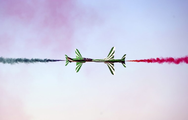 Image: Members of Royal Saudi Hawks Air Force Aerobatic team perform with Hawk planes