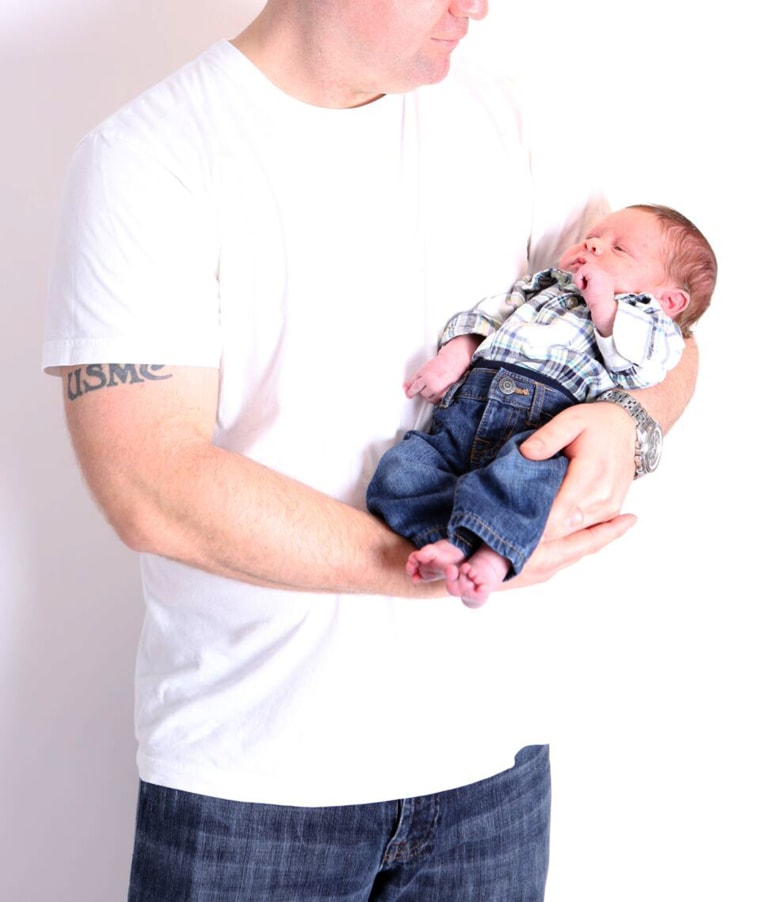 Dennis Cosgrove holding baby Declan