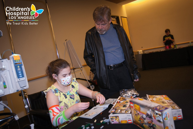 Mark Hamill chats with a young patient at Children's Hospital Los Angeles.