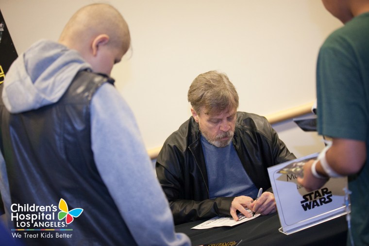 "Star Wars" star Mark Hamill signs autographs at Children's Hospital Los Angeles on Dec. 4, 2015.