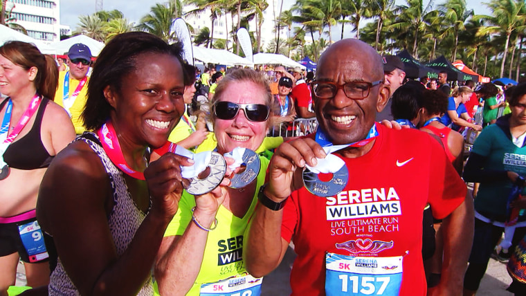 Al Roker and his wife, Deborah, show off their finishing medals with Rothman