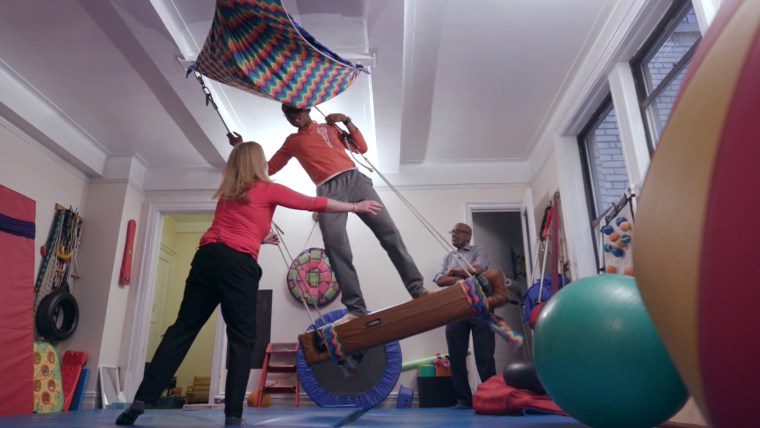 Al Roker and his son, Nick, during occupational therapy session