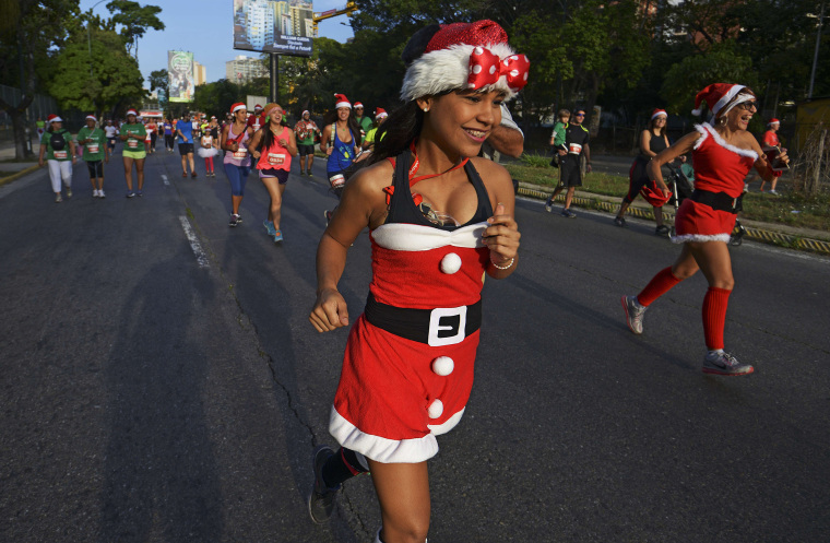 Image: VENEZUELA-SANTA CLAUS-RUN